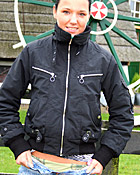  Dutch teen girl flashing her tits in front of windmills