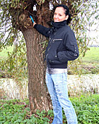  Dutch teen girl flashing her tits in front of windmills