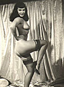 Betty Page with sexy stockings showing her sensual body