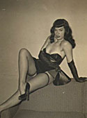 Betty Page with sexy stockings showing her sensual body