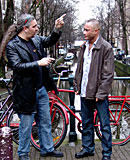 Heavy blonde hooker with big tits jerking an Italian cock