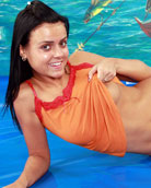 Slim teenager brunette spreads her pussy wide for a toy