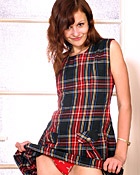 Horny teenage brunette gets completely naked and masturbates