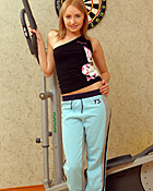 A very sexy teenager stripping her clothes for the camera