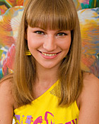 A very cute teenager shaving her wet pussy alone at home