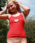 Sexy and daring teenager loves undressing outside on a road