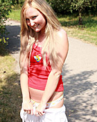 Sexy and daring teenager loves undressing outside on a road