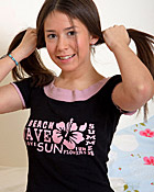 Horny teenage babe takes a big red dildo in the asshole