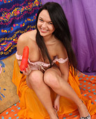 Naked sweetie reaching an orgasm with a big plastic dick