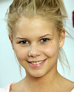 Hot teenage sweetie having some fun in locker room with toy