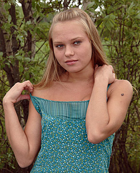 Daring teenage chick masturbating in the forest with a toy