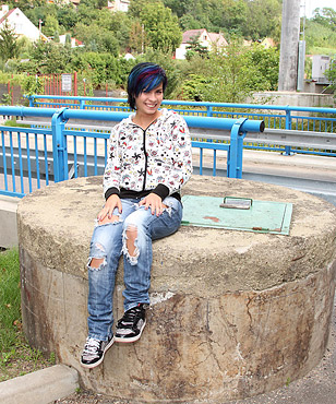 Teenage babe with blue hair plays with her soaked pussy