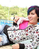 Teenage babe with blue hair plays with her soaked pussy