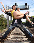 A teenage chick loves daring anal shagging on a railway