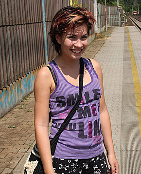 A teenage cutie with short hair fucks large solid penis