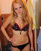 Horny young teenage cutie masturbates nude in the shower