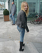 Daring teenage girl gives a horny blowjob in a clothing shop