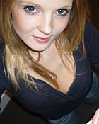 Daring teenage girl gives a horny blowjob in a clothing shop