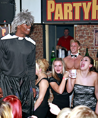 Drunk partygoers having outrageous sex inside of a publicbar