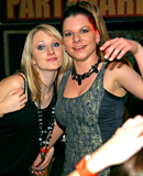 Drunk partygoers having outrageous sex inside of a publicbar