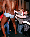 Drunk partygoers having outrageous sex inside of a publicbar