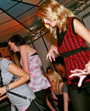 Wild and crazy party girls sucking and fucking in a bar