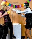  Wet and messy lesbians get horny playing with colorful paint