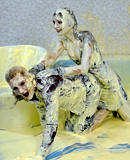 Two hot babes get covered in goo during messy trivia game