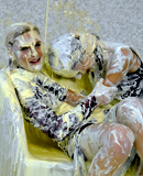 Two hot babes get covered in goo during messy trivia game