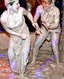 Smoking hot brunette babes wrestling around in a messy pit