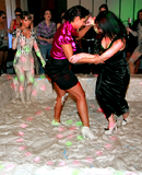 Smoking hot brunette babes wrestling around in a messy pit