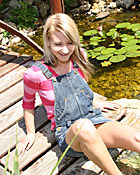 Sexy teenage cutie rubbing her soaked cooch in the garden