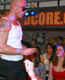 Hot sluts sucking and fucking male strippers in a public bar