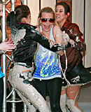 Two sexy daring girls enjoy swimming in cream at the club