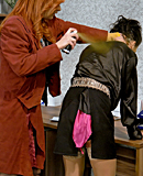 Two handsome fetish girls enjoy playing with their clothes