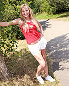 Cute chick stroking her snatch outside on a public road