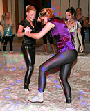 Two very hot teenage girls enjoy getting dirty in a mud tub