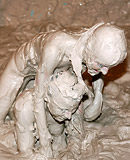 Very hot teenage girls bathing in the nude in wet dirty mud