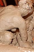 Two very hot lesbian babes duke it out in some thick mud