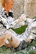  Two sexy babes spraying shaving cream on each other outside