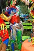 Three hot babes getting messy and naked with paint outside