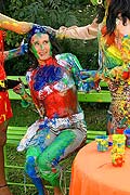 Three hot babes getting messy and naked with paint outside