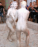  Hot teen lesbian girls love playing in a tub of wet mud