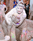  Hot teen lesbian girls love playing in a tub of wet mud