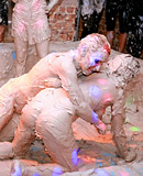  Hot teen lesbian girls love playing in a tub of wet mud