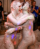  Hot teen lesbian girls love playing in a tub of wet mud