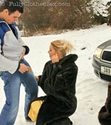 Hot blonde babes wearing fur sucking cock outside in snow