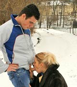 Hot blonde babes wearing fur sucking cock outside in snow