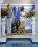 Sexy lesbians love swimming together in a big public pool