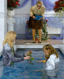 Sexy lesbians love swimming together in a big public pool